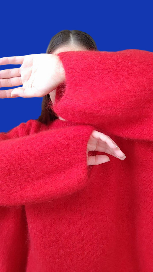 Genser med brede og voluminøse ermer