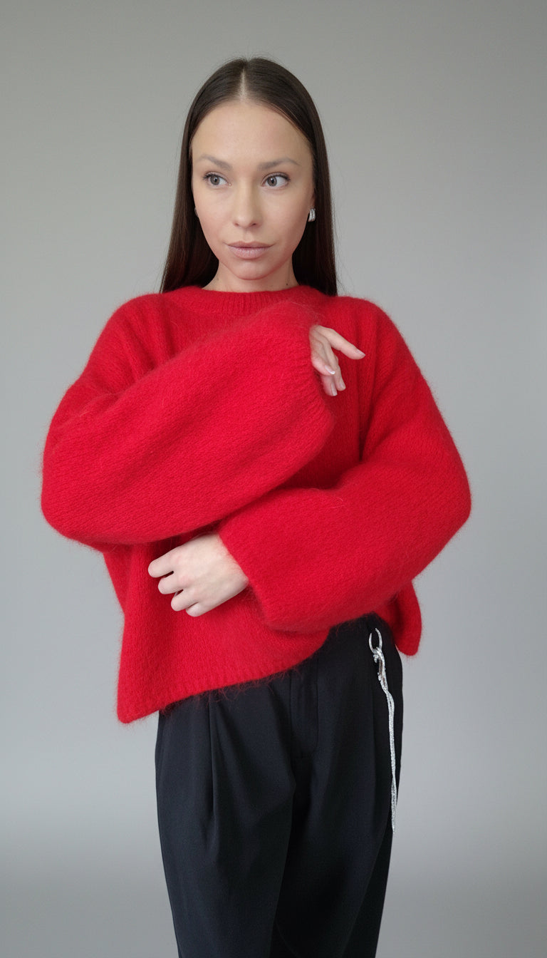 Genser med brede og voluminøse ermer