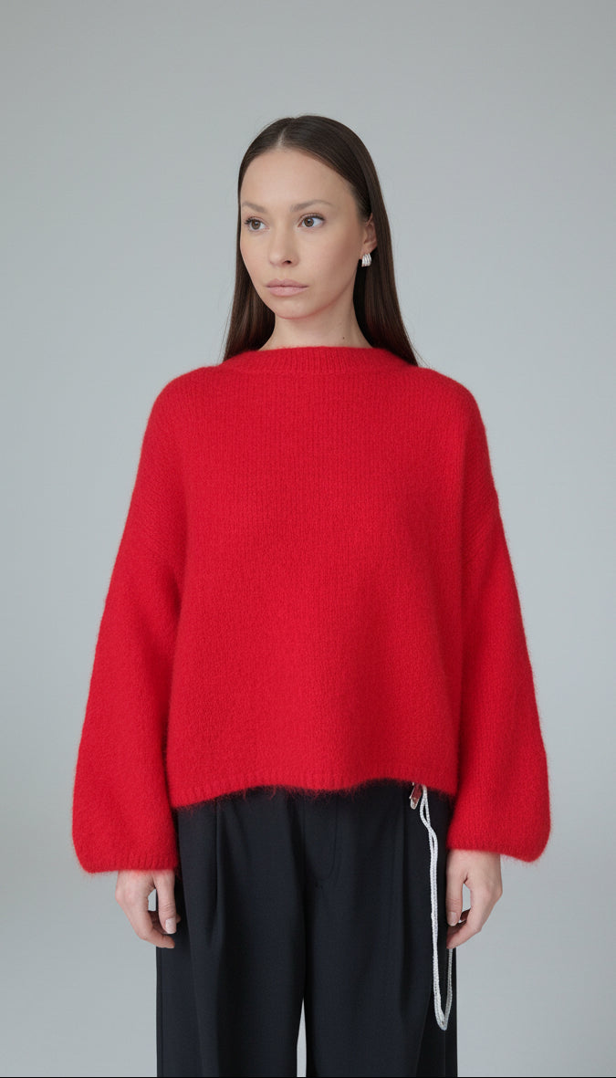 Genser med brede og voluminøse ermer