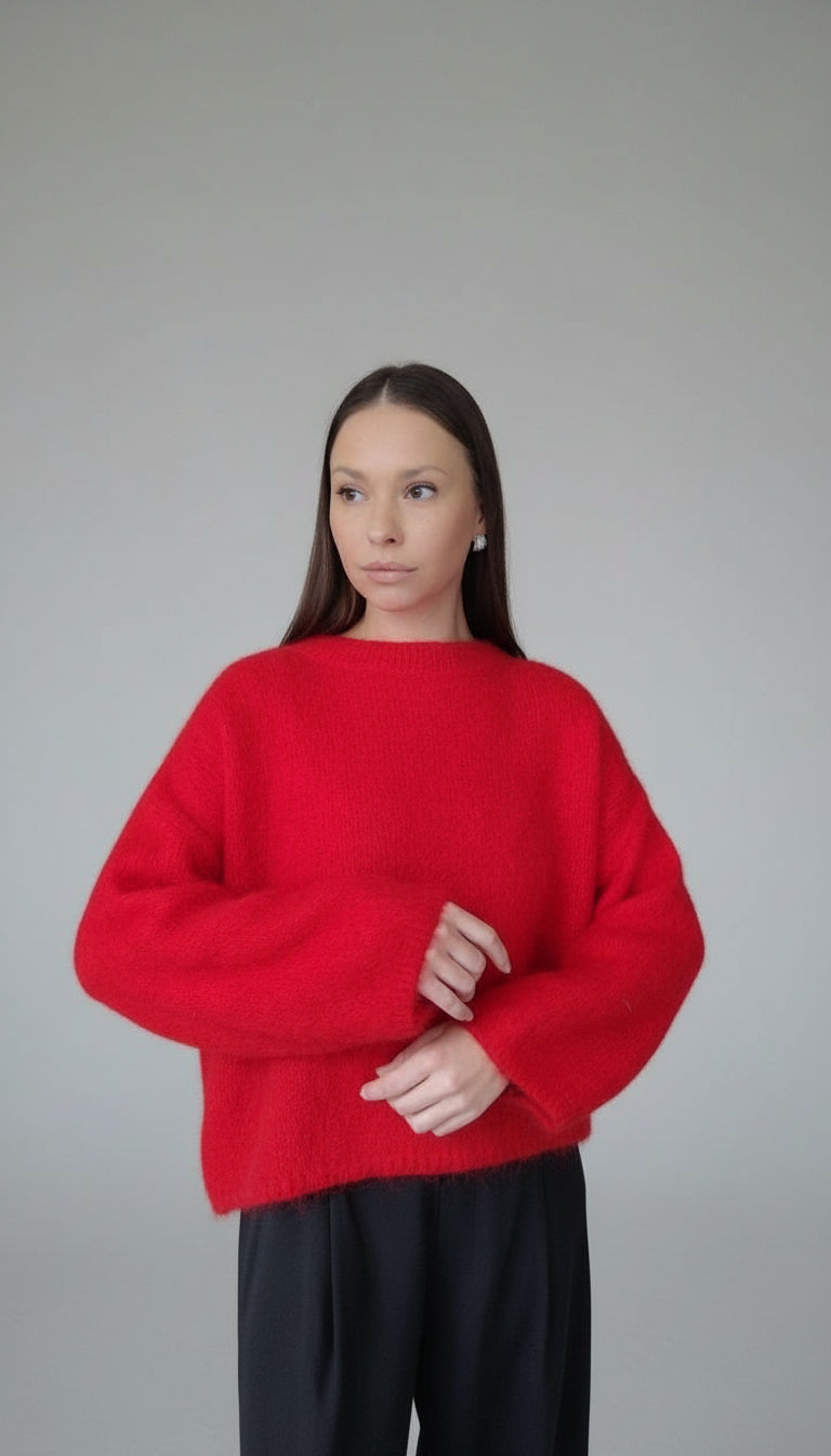 Genser med brede og voluminøse ermer