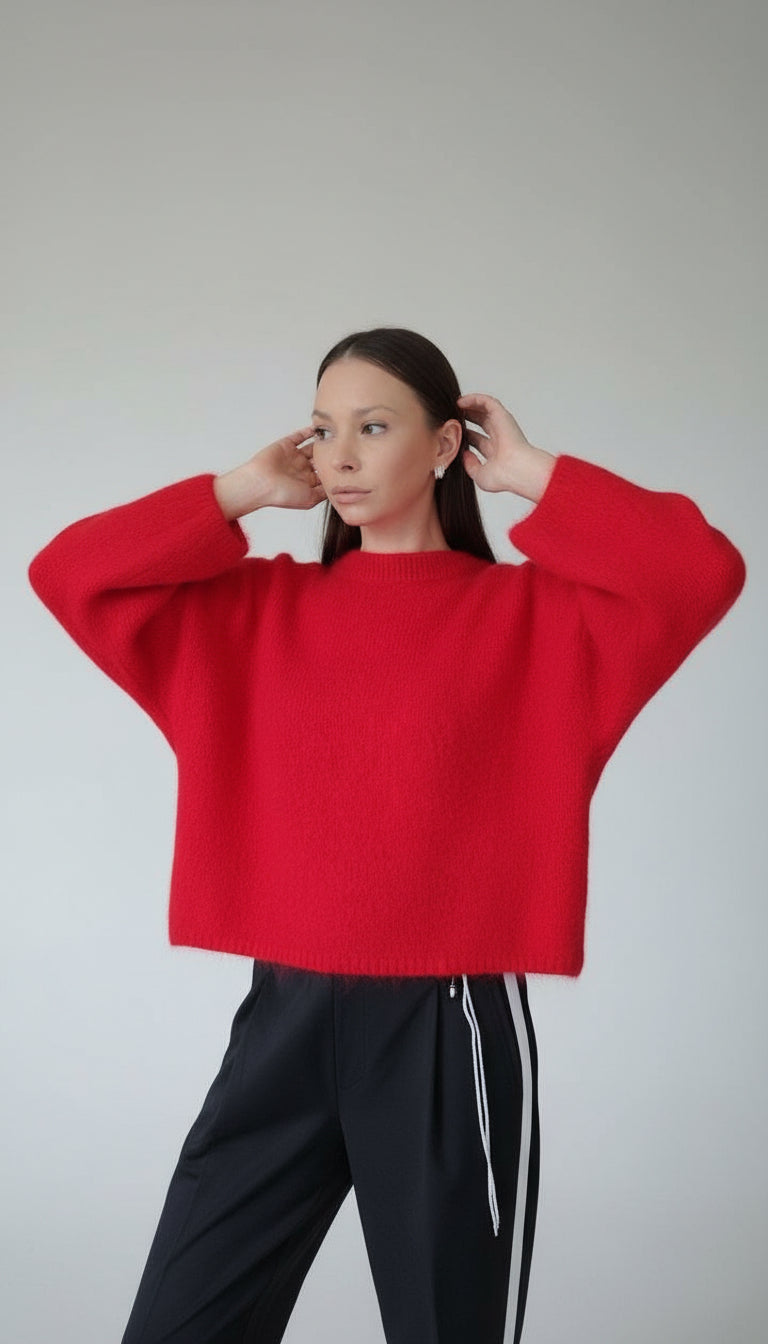 Genser med brede og voluminøse ermer