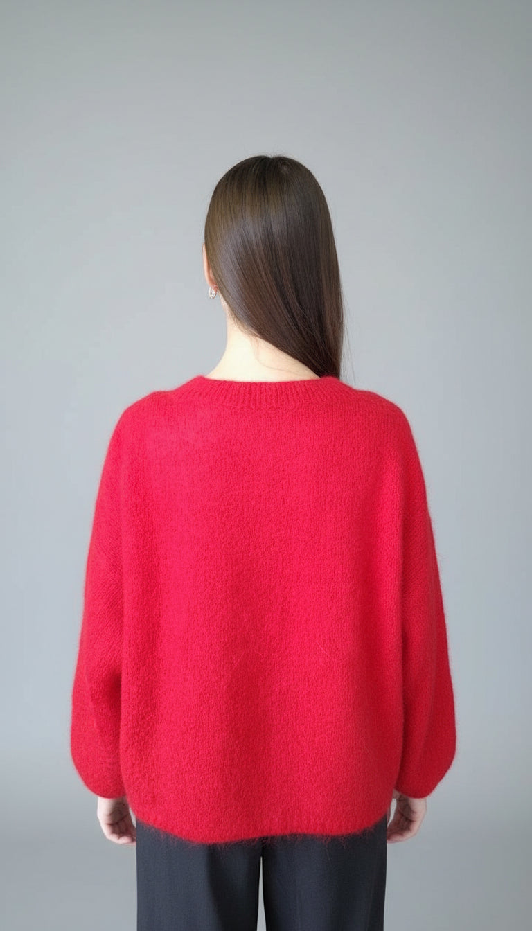 Genser med brede og voluminøse ermer