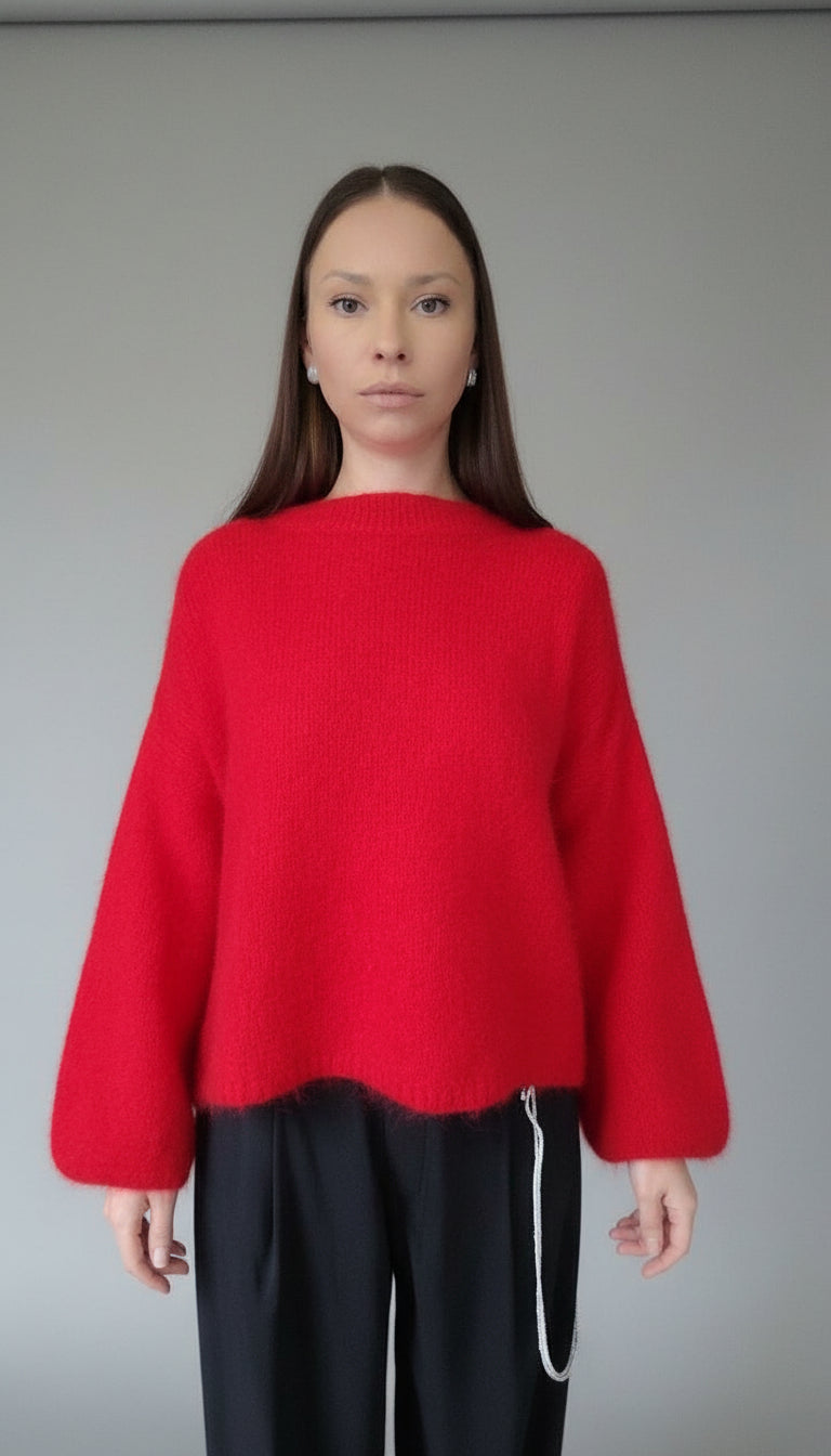 Genser med brede og voluminøse ermer